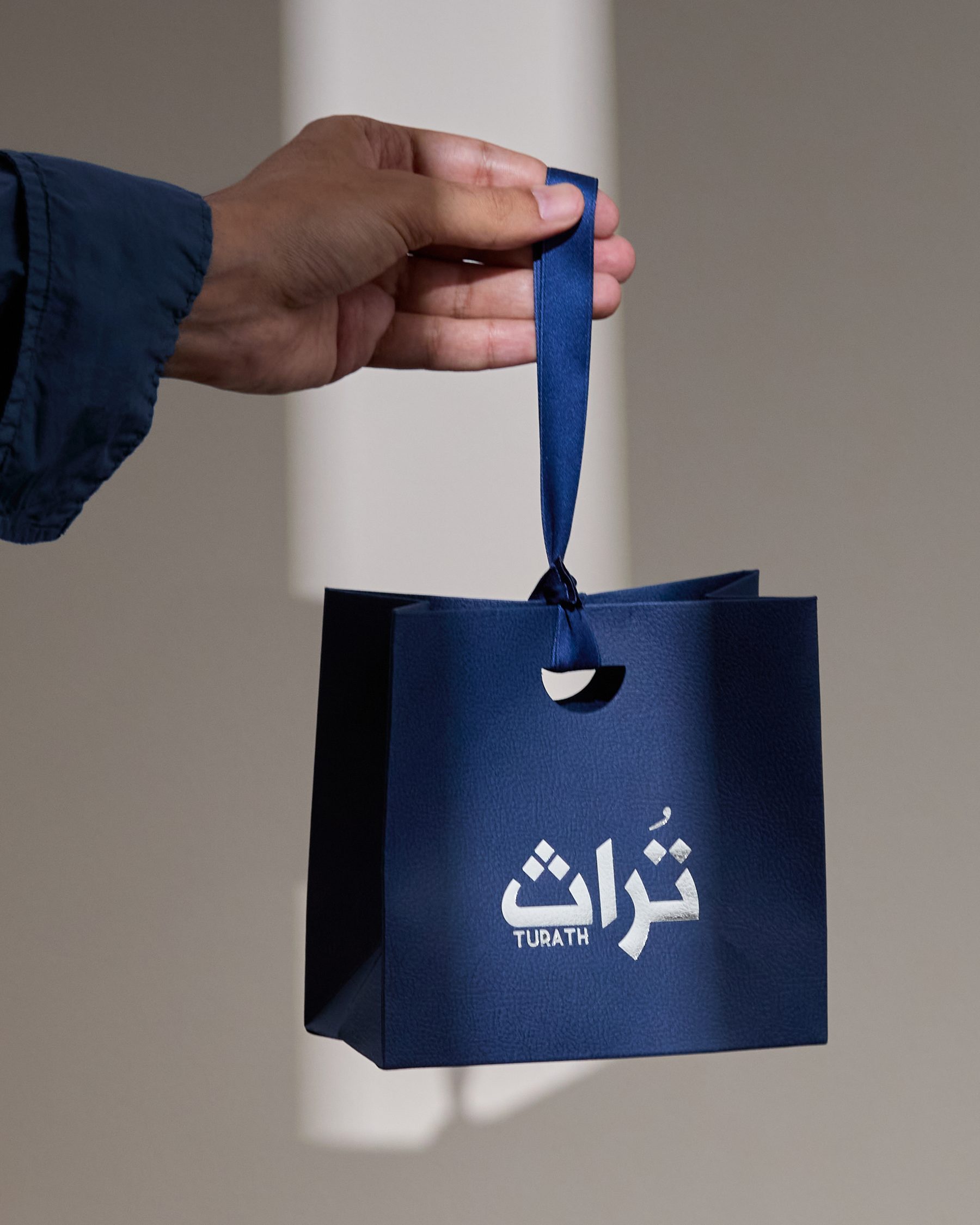 Turath gift set in navy gift bag with ribbon